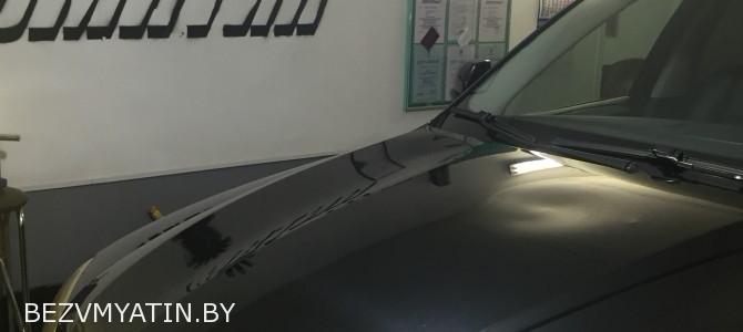 BMW X 5 — вмятина на капоте