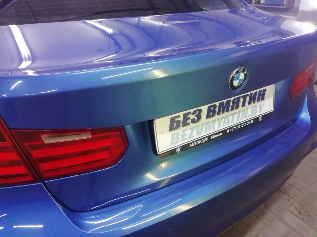 BMW - вмятина на крышке багажника после удаления